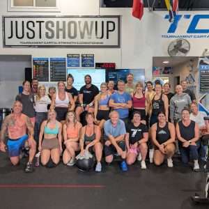 TCSC members and guests working out together in a Bring a Friend class, showcasing community and energy inside the gym.
